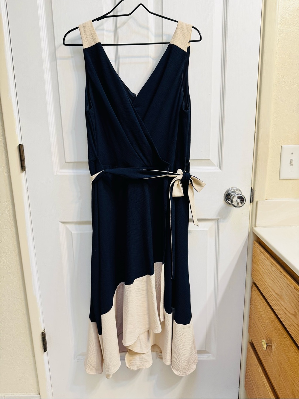 Sleeveless Navy and Cream High-Low Wrap Dress with Contrast Trim